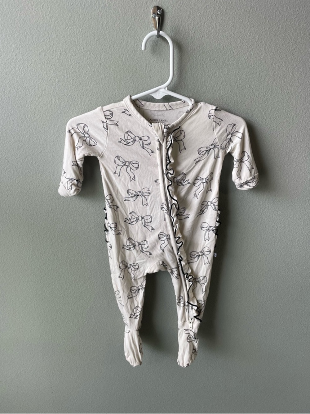 Caden Lane x Emily Travis Black and White Bows Bamboo Zippy Sleeper with Ruffles